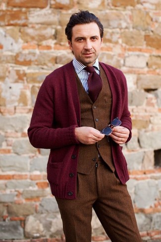 Knit Cardigan Outfits For Men: Hard proof that a knit cardigan and brown wool dress pants look amazing if you wear them together in a sophisticated outfit for today's gent.
