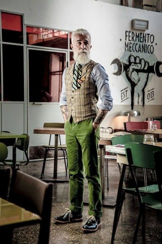 Dark Green Corduroy Chinos Outfits: This combination of a tan plaid waistcoat and dark green corduroy chinos comes to rescue when you need to look effortlessly neat but have zero time. A pair of black leather brogues is the glue that will pull this outfit together.