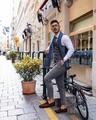 Blue Print Scarf Outfits For Men: This pairing of a charcoal waistcoat and a blue print scarf is on the off-duty side yet it's also stylish and incredibly stylish. Add a pair of dark brown suede loafers to the mix to spice things up.