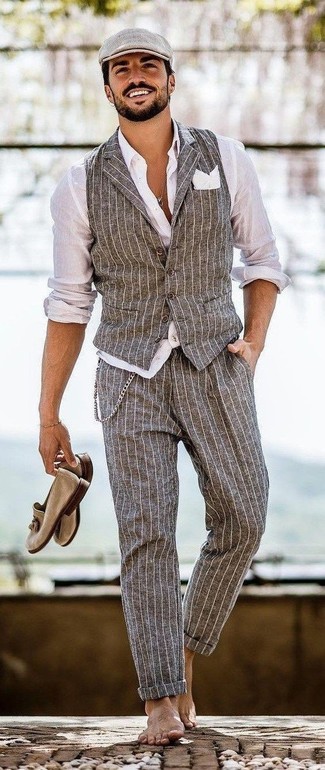 Beige Flat Cap Outfits For Men: You'll be surprised at how very easy it is for any gentleman to get dressed this way. Just a grey vertical striped waistcoat worn with a beige flat cap. Want to dial it up with shoes? Add tan suede tassel loafers to the equation.