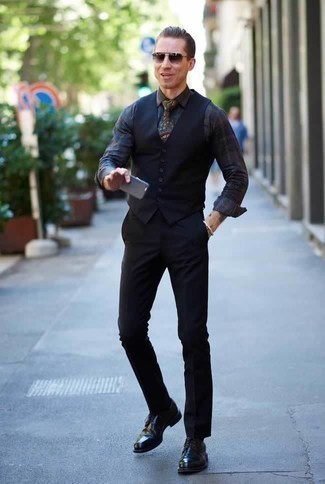 Dark Brown Paisley Tie Outfits For Men: Go for a navy waistcoat and a dark brown paisley tie if you're going for a sleek, dapper ensemble. Feeling brave? Switch up your look by finishing off with black leather derby shoes.