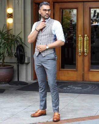 Grey Dress Pants Outfits For Men: This classy pairing of a navy and white gingham waistcoat and grey dress pants is a popular choice among the sartorially superior guys. A nice pair of tobacco leather double monks is a simple way to punch up your look.