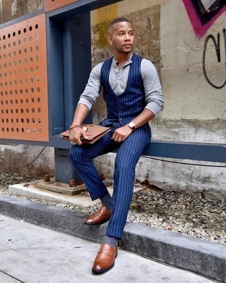 Men's Navy Vertical Striped Waistcoat, Grey Long Sleeve Henley Shirt, Navy Vertical Striped Dress Pants, Tobacco Leather Loafers