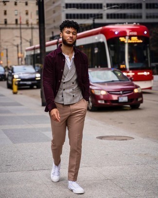 Violet Corduroy Long Sleeve Shirt Outfits For Men: A violet corduroy long sleeve shirt and khaki chinos are a nice combo worth having in your daily routine. For something more on the casual side to finish off your ensemble, introduce a pair of white canvas high top sneakers to the equation.