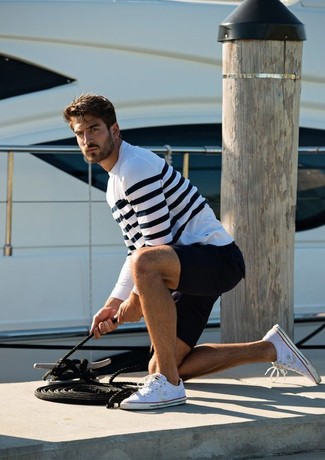 White and Black Horizontal Striped Crew-neck Sweater Outfits For Men: A white and black horizontal striped crew-neck sweater and black shorts make for the ultimate relaxed style for any gent. Complete your ensemble with a pair of white low top sneakers and ta-da: the outfit is complete.