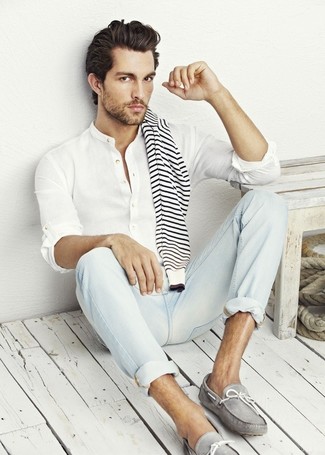 White Linen Long Sleeve Shirt Outfits For Men: This combo of a white linen long sleeve shirt and light blue jeans is well-executed and yet it looks easy and ready for anything. This ensemble is completed nicely with a pair of grey leather driving shoes.