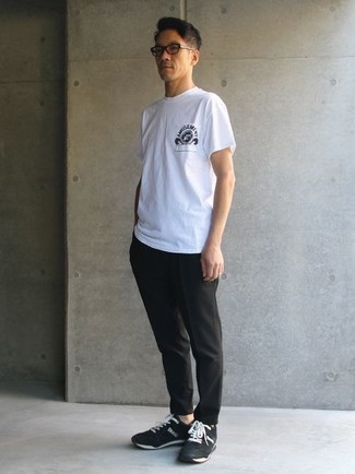 White and Black Crew-neck T-shirt with Black Chinos Outfits: Breathe new life into your daily off-duty wardrobe with a white and black crew-neck t-shirt and black chinos. Bring a dose of stylish casualness to by slipping into a pair of black and white athletic shoes.