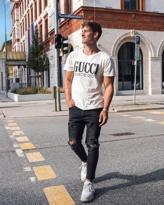 Black Skinny Jeans with Athletic Shoes Outfits For Men: Why not dress in a white and black print crew-neck t-shirt and black skinny jeans? Both pieces are very functional and will look cool paired together. Add athletic shoes to this ensemble and the whole outfit will come together.