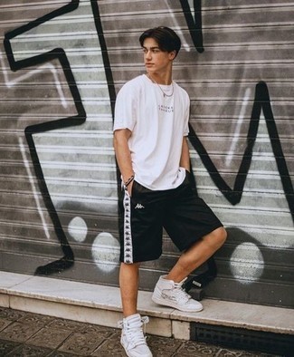 Black Bracelet Outfits For Men: A white and black print crew-neck t-shirt looks so cool and casual when combined with a black bracelet. Complete your look with a pair of white print leather high top sneakers to effortlessly kick up the style factor of your ensemble.