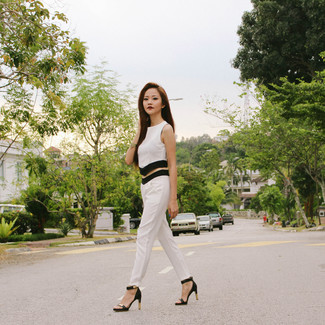 Women's White and Black Cropped Top, White and Black Skinny Pants, Black and Gold Leather Heeled Sandals, Gold Bracelet