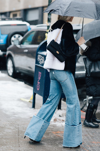Women's White and Black Fur Jacket, Light Blue Flare Jeans, Black Leather Satchel Bag