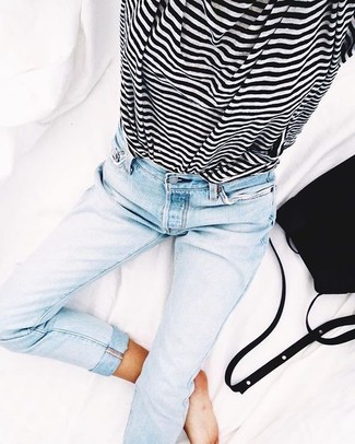 Light Blue Skinny Jeans Outfits: Such essentials as a white and black horizontal striped crew-neck t-shirt and light blue skinny jeans are an easy way to introduce extra cool into your off-duty styling routine.