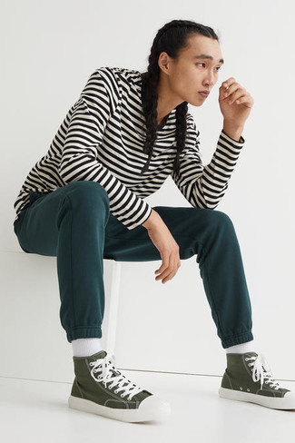 Dark Green Sweatpants Outfits For Men: Pair a white and black horizontal striped long sleeve t-shirt with dark green sweatpants to get an edgy and functional getup. Olive canvas high top sneakers complete this ensemble quite well.