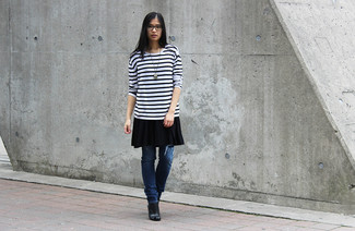 White and Black Horizontal Striped Oversized Sweater Outfits: If you feel more confident in comfy clothes, you'll fall in love with this casual combination of a white and black horizontal striped oversized sweater and navy ripped skinny jeans. Here's how to dress up this look: black leather ankle boots.
