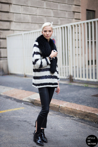 White and Black Horizontal Striped Oversized Sweater Outfits: A white and black horizontal striped oversized sweater and black leather skinny jeans are absolute essentials if you're piecing together an off-duty closet that matches up to the highest style standards. Our favorite of an endless number of ways to finish off this ensemble is with black leather ankle boots.
