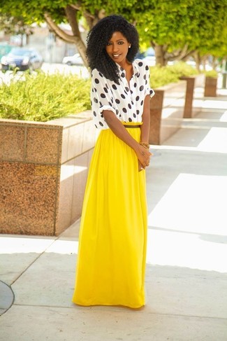 Yellow Pleated Maxi Skirt Outfits: This casual pairing of a white and black polka dot button down blouse and a yellow pleated maxi skirt is extremely easy to pull together in no time, helping you look awesome and prepared for anything without spending a ton of time going through your wardrobe.