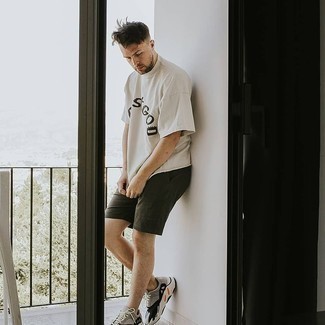 White and Black Print Crew-neck T-shirt Outfits For Men: A white and black print crew-neck t-shirt and dark green shorts are a cool pairing to add to your casual repertoire. Rev up the wow factor of this look by finishing off with grey athletic shoes.
