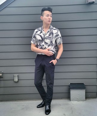 Men's White and Black Floral Short Sleeve Shirt, Black Chinos, Black Leather Chelsea Boots, Black Horizontal Striped Canvas Watch