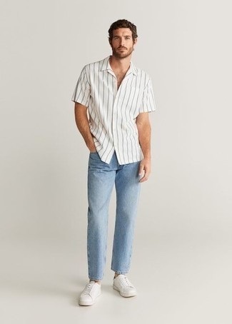 Men's White and Black Vertical Striped Short Sleeve Shirt, Light Blue Jeans, White Canvas Low Top Sneakers