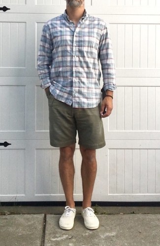 White and Blue Plaid Long Sleeve Shirt Outfits For Men: This combo of a white and blue plaid long sleeve shirt and olive shorts is perfect for most casual occasions. Let your styling expertise really shine by completing this ensemble with a pair of white canvas low top sneakers.