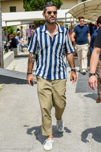 Men's White and Blue Vertical Striped Short Sleeve Shirt, Khaki Chinos, White Low Top Sneakers, Olive Sunglasses