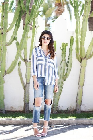 White and Black Button Down Blouse Outfits: This outfit with a white and black button down blouse and blue ripped jeans isn't hard to score and easy to adapt. Unimpressed with this look? Enter white leather heeled sandals to jazz things up.