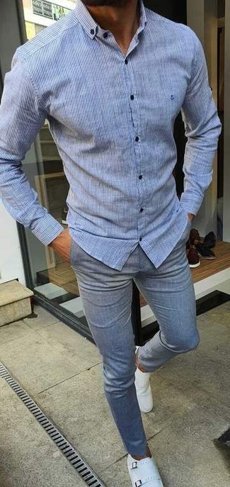 Light Blue Chinos Outfits: Seriously stylish yet functional, this outfit features a white and blue vertical striped long sleeve shirt and light blue chinos. For a truly modern on and off-duty mix, add white leather double monks to the mix.