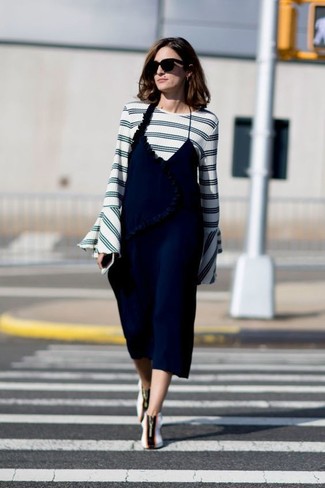 Navy Cami Dress Outfits: If you're looking for a casual but also incredibly stylish outfit, pair a navy cami dress with a white and navy horizontal striped crew-neck sweater. You can follow the casual route with footwear by slipping into a pair of white and black slip-on sneakers.