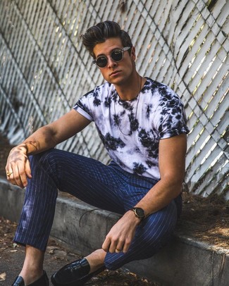 White and Navy Tie-Dye Crew-neck T-shirt Outfits For Men: A white and navy tie-dye crew-neck t-shirt and navy vertical striped chinos are a great getup worth having in your day-to-day lineup. Kick up the wow factor of this look with a pair of black leather loafers.