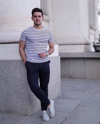 White and Blue Horizontal Striped Crew-neck T-shirt Outfits For Men: Pair a white and blue horizontal striped crew-neck t-shirt with navy chinos for a day-to-day outfit that's full of style and character. A pair of white canvas low top sneakers is a good idea to round off your look.