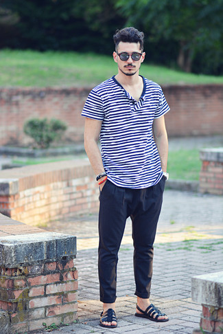 Black Leather Sandals Outfits For Men: For comfort dressing with a twist, dress in a white and navy horizontal striped henley shirt and navy chinos. A pair of black leather sandals will easily dial down an all-too-polished getup.