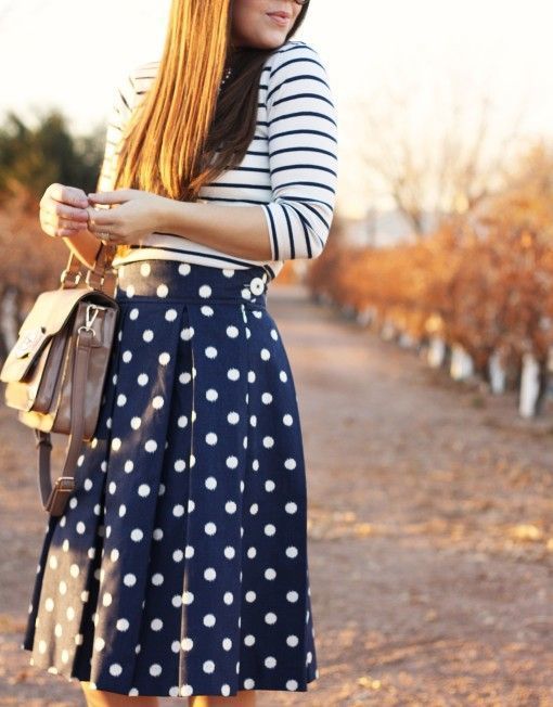 Women's White and Navy Horizontal Striped Crew-neck Sweater, Navy and White  Polka Dot Skater Skirt, Beige Leather Satchel Bag | Lookastic