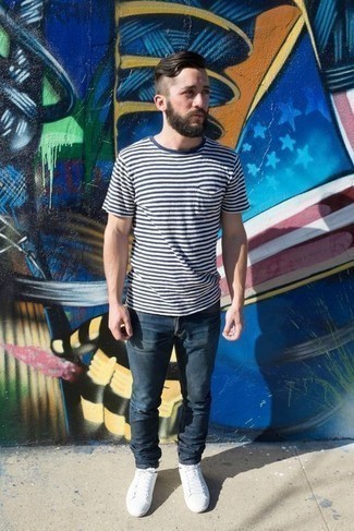 Horizontal Striped Crew-neck T-shirt Casual Outfits For Men: Consider pairing a horizontal striped crew-neck t-shirt with navy jeans for relaxed dressing with a city style take. We're loving how this whole look comes together thanks to a pair of white canvas low top sneakers.
