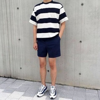 White and Navy Athletic Shoes Outfits For Men: If you're hunting for an off-duty yet seriously stylish look, pair a white and navy horizontal striped crew-neck t-shirt with navy shorts. For something more on the daring side to finish off your look, complete this ensemble with white and navy athletic shoes.