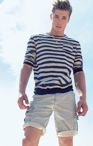 White and Black Horizontal Striped Long Sleeve T-Shirt Outfits For Men: This off-duty combo of a white and black horizontal striped long sleeve t-shirt and beige shorts is super easy to throw together without a second thought, helping you look awesome and prepared for anything without spending a ton of time combing through your closet.