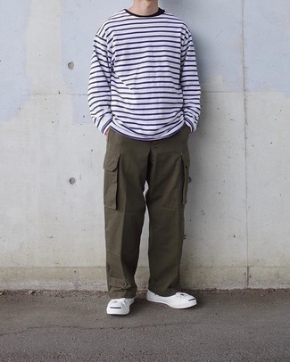White and Navy Horizontal Striped Long Sleeve T-Shirt Outfits For Men: This casual combination of a white and navy horizontal striped long sleeve t-shirt and brown cargo pants is extremely versatile and really apt for whatever's on your to-do list today. For a dressier aesthetic, why not introduce a pair of white canvas low top sneakers to the equation?