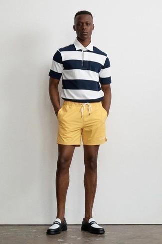 Yellow Swim Shorts Outfits: A white and navy horizontal striped polo and yellow swim shorts are amazing menswear must-haves to have in your casual rotation. Black and white leather loafers will bring an added dose of style to an otherwise all-too-common look.