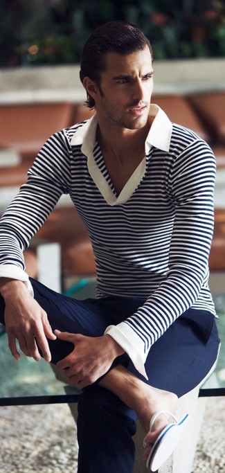 Flip Flops Outfits For Men: A white and navy horizontal striped polo and navy chinos are a cool combo worth incorporating into your daily casual lineup. You could perhaps get a little creative when it comes to shoes and dial down your outfit by slipping into flip flops.