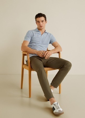 White and Navy Horizontal Striped Polo Outfits For Men: For an off-duty look, try pairing a white and navy horizontal striped polo with olive chinos — these two items play beautifully together. A good pair of white and black leather low top sneakers pulls this look together.