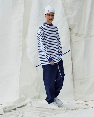Men's White and Navy Horizontal Striped Long Sleeve T-Shirt, Navy Jeans, White Leather Low Top Sneakers, White Beanie