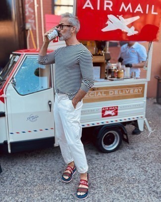 Canvas Sandals Outfits For Men: If you're hunting for a relaxed casual yet on-trend outfit, make a white and navy long sleeve t-shirt and white chinos your outfit choice. Send an otherwise traditional look a less formal path by rocking a pair of canvas sandals.