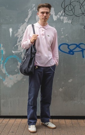 Men's Black and White Print Canvas Tote Bag, White and Navy Leather Low Top Sneakers, Navy Chinos, Pink Polo Neck Sweater