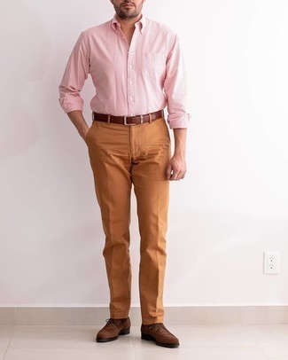 Dark Brown Suede Derby Shoes Outfits: Extremely dapper and practical, this relaxed combination of a white and red vertical striped long sleeve shirt and tobacco chinos provides with variety. Here's how to give a dose of polish to this look: dark brown suede derby shoes.