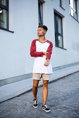 Beige Shorts Outfits For Men: Stand out among other gentlemen by opting for a white and red long sleeve t-shirt and beige shorts. Complete this outfit with black and white canvas low top sneakers et voila, your getup is complete.