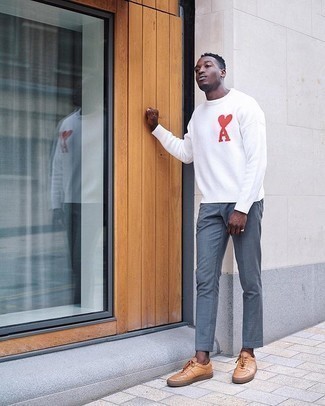 White and Red Print Crew-neck Sweater Outfits For Men: Rock a white and red print crew-neck sweater with grey dress pants to look like a true style maverick. Bump up your ensemble by finishing off with tan leather low top sneakers.