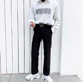 Men's Black Embellished Leather Belt, White Athletic Shoes, Black Chinos, White and Black Print Long Sleeve Shirt