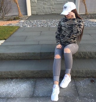 Women's White Cap, White Athletic Shoes, Grey Ripped Skinny Jeans, Grey Camouflage Crew-neck Sweater