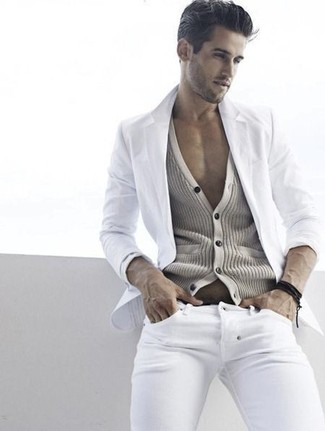Knit Cardigan Outfits For Men: Consider wearing a knit cardigan and white skinny jeans to create a seriously dapper and modern-looking casual outfit.