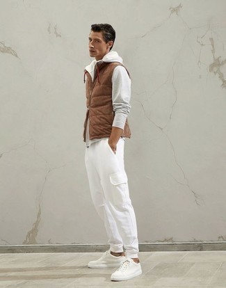 Men's White Canvas Low Top Sneakers, White Cargo Pants, Grey Hoodie, Brown Quilted Gilet