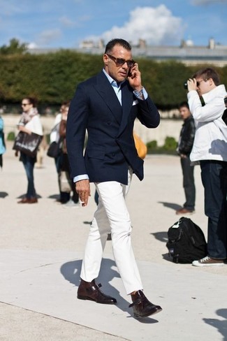 George Cortina wearing Dark Brown Leather Double Monks, White Chinos, Light Blue Dress Shirt, Navy Double Breasted Blazer